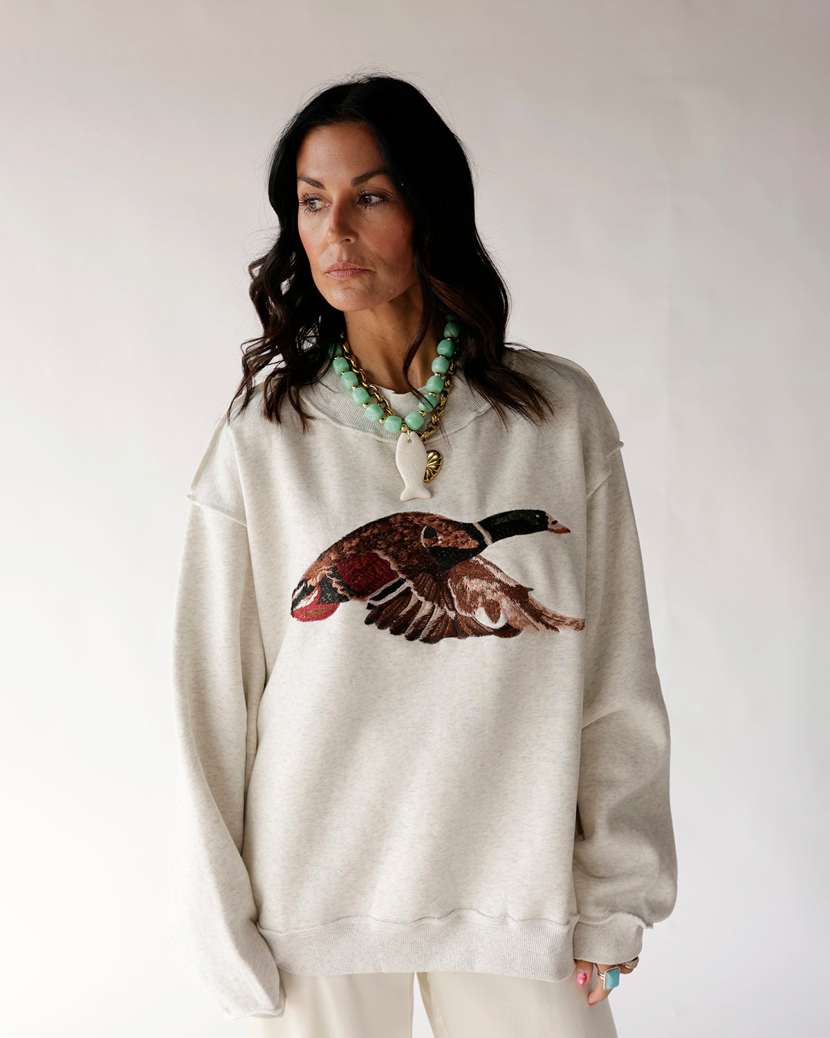 Oversized oatmeal sweatshirt with large mallard duck graphic, mock neck, long sleeves