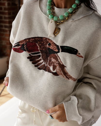 Heather gray mock neck sweatshirt with large mallard duck embroidery on chest