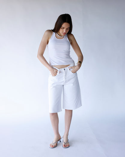 AGOLDE Ramona wide-leg white denim shorts, knee-length, worn with white crop top