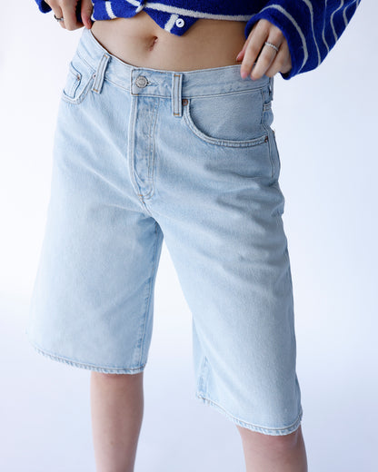 AGOLDE Ramona light wash blue denim bermuda shorts with classic five-pocket styling