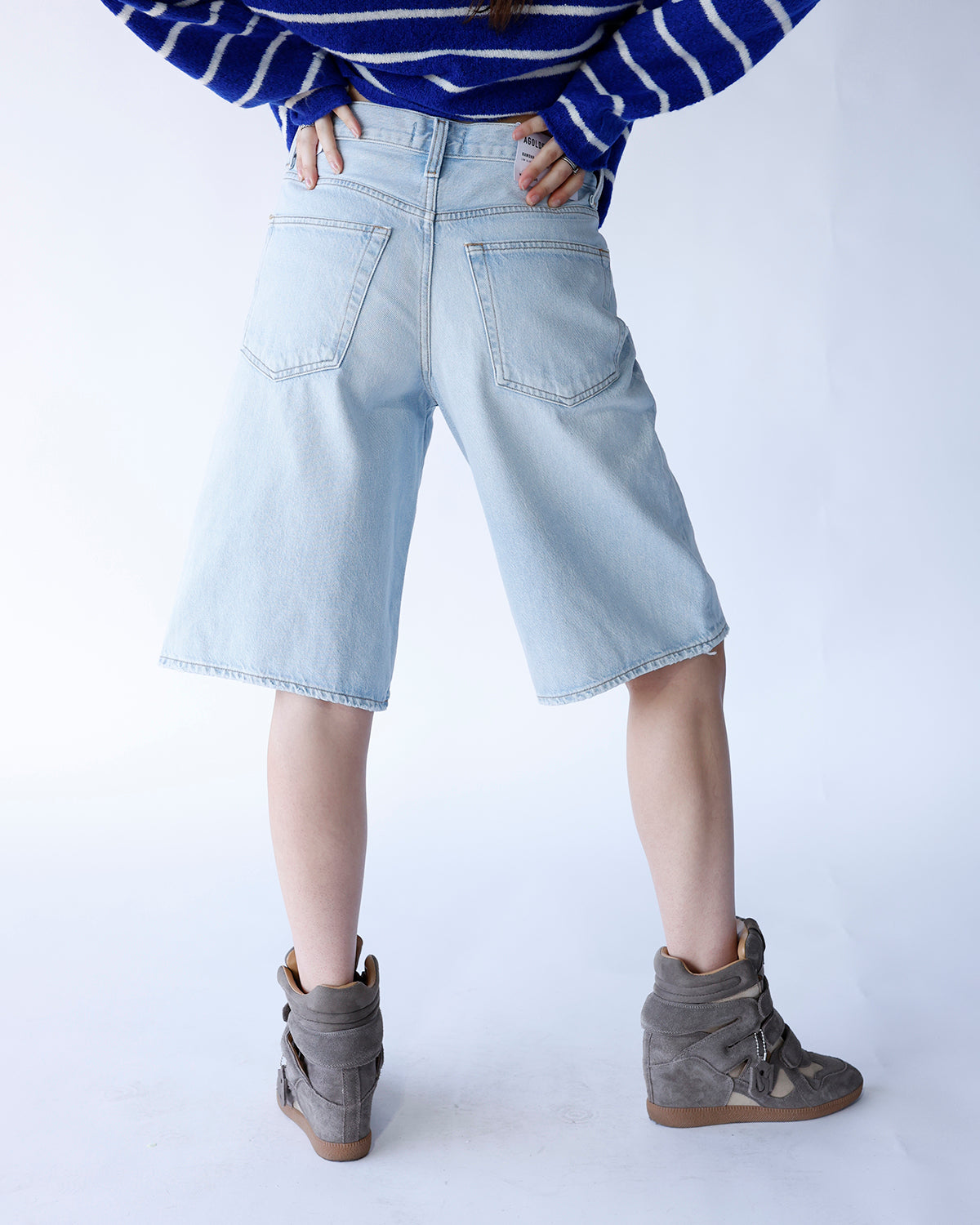 AGOLDE Ramona light wash wide-leg denim shorts, back view, knee length