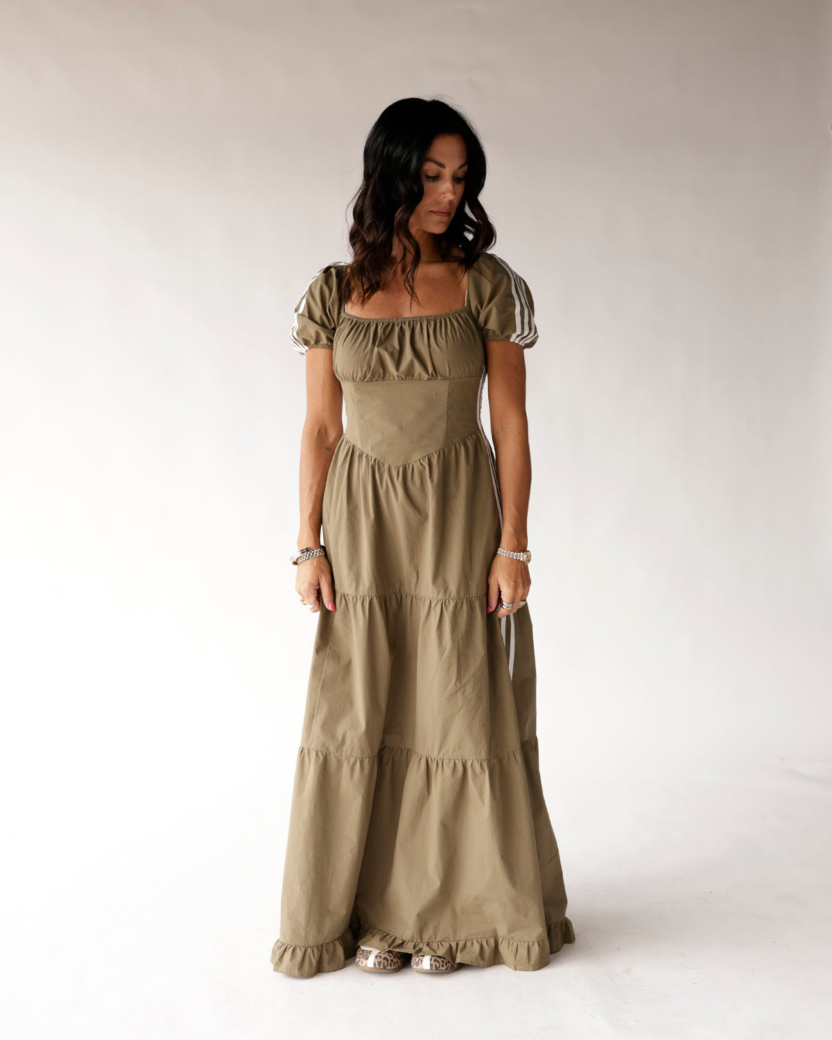 Olive green puff sleeve tiered maxi dress with corset bodice and ruffle hem