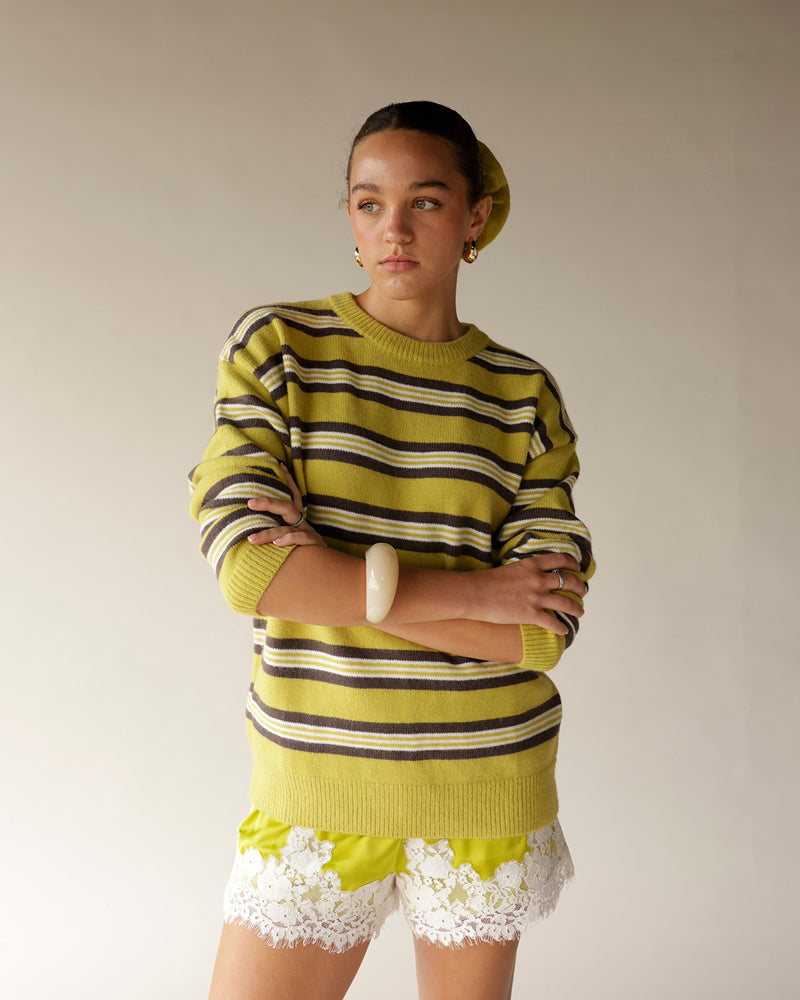 Yellow and brown striped knit crewneck sweater with ribbed cuffs and hem