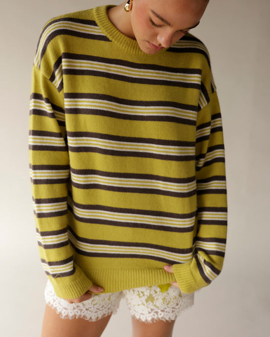 Yellow striped crewneck sweater with dark brown and white horizontal stripes