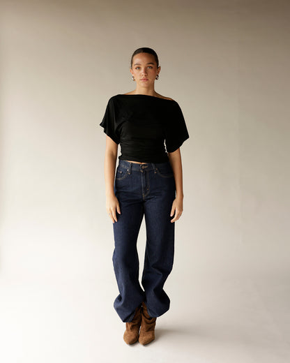 Dark navy wide-leg denim pants with high waist and classic five-pocket styling
