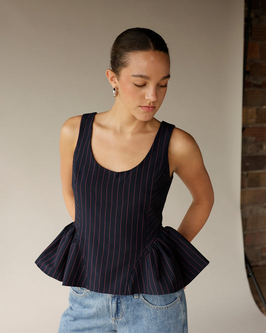 Navy pinstripe peplum tank top with pink stripes and scoop neckline