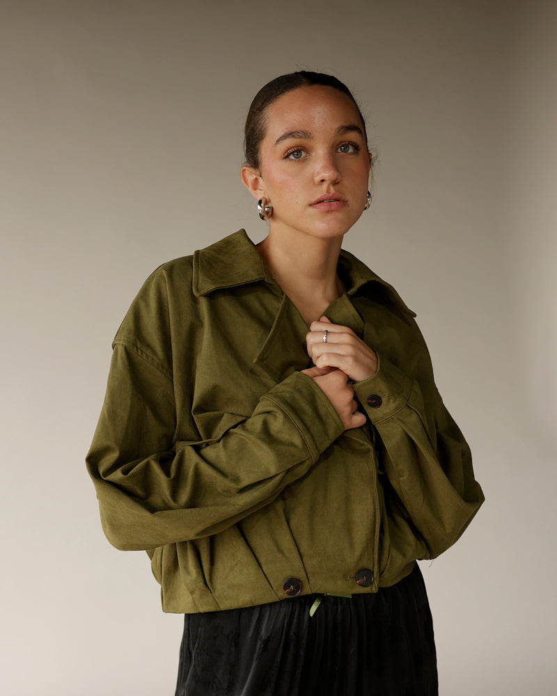 Women's olive green suede cropped button-up jacket with spread collar and long sleeves