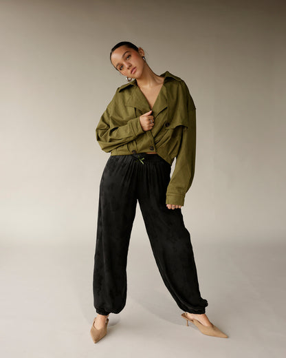 Women's olive green cropped trench jacket with button front and wide lapels
