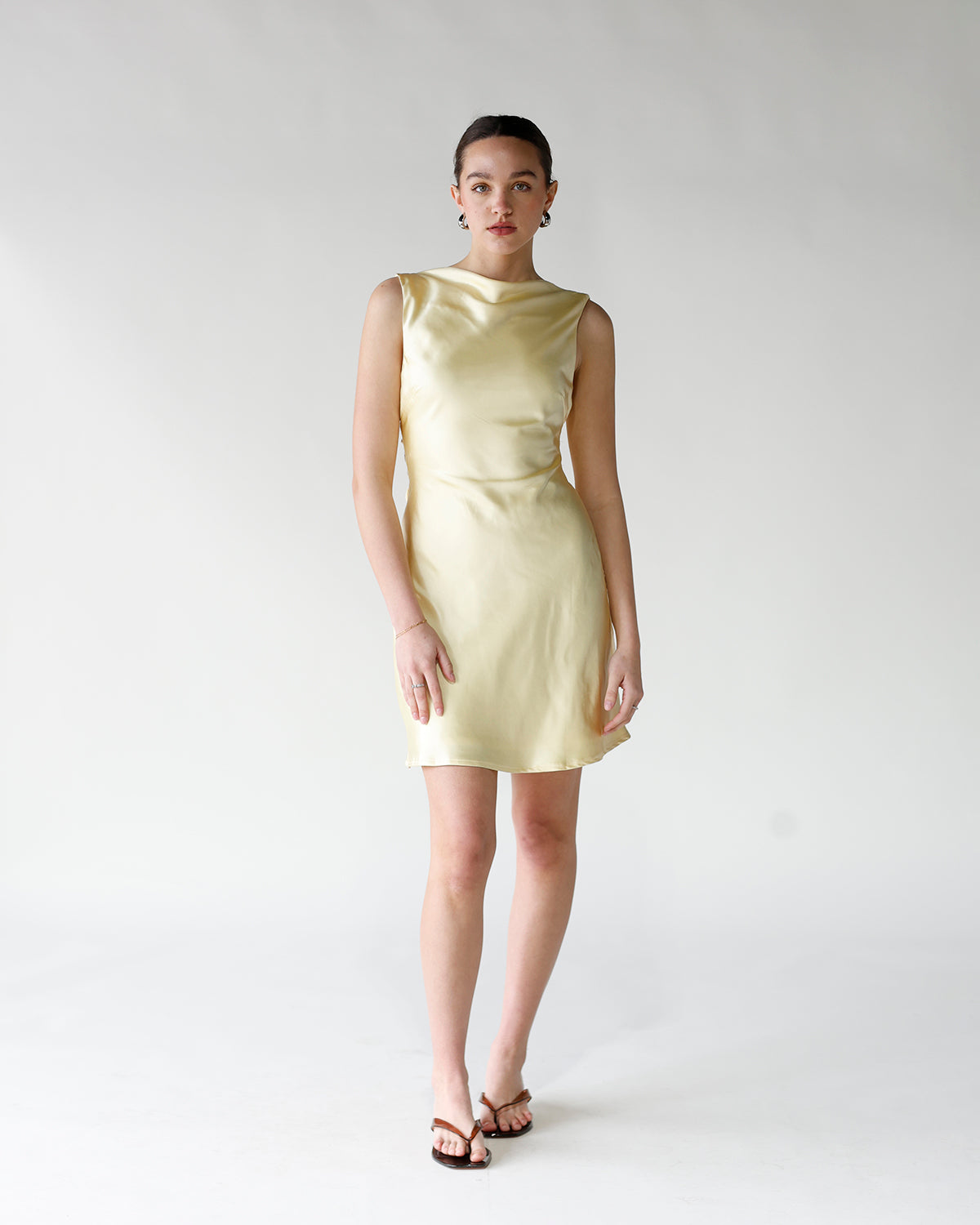 yellow mini dress sleeveless boat neck back tie detail yellow mini dress spring mini dress