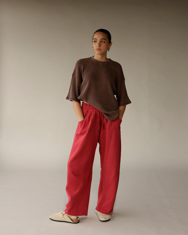 Brown ribbed oversized short-sleeve crewneck tee with dropped shoulders and raw edges