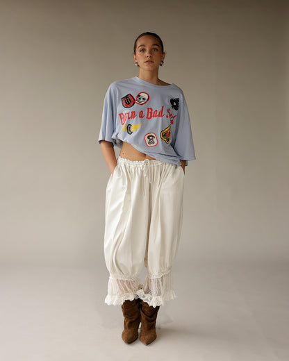 Ivory satin boho pants with lace hem trim and drawstring waist