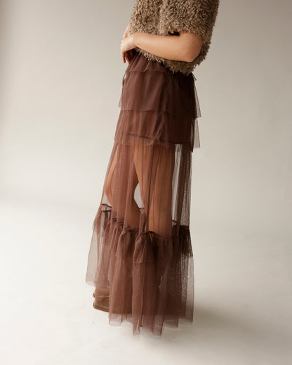 Brown tiered sheer tulle maxi skirt paired with textured brown fuzzy sweater top