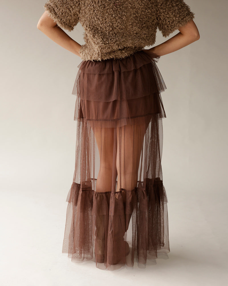 Brown textured cropped sweater paired with sheer tiered brown tulle maxi skirt