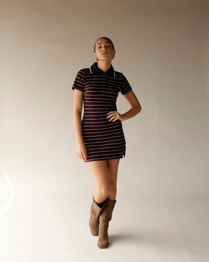 Burgundy striped polo mini dress with navy collar and short sleeves, styled with tan cowboy boots