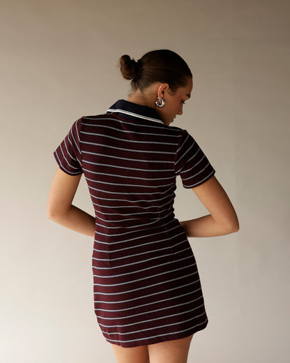Burgundy striped polo mini dress with navy collar and short sleeves, back view