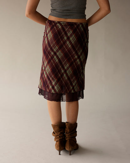 Gray ribbed cropped tank top styled with plaid midi skirt and brown suede boots