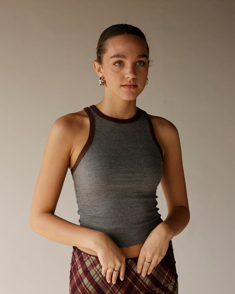 Gray ribbed sleeveless tank top with dark brown contrast trim at neckline and straps