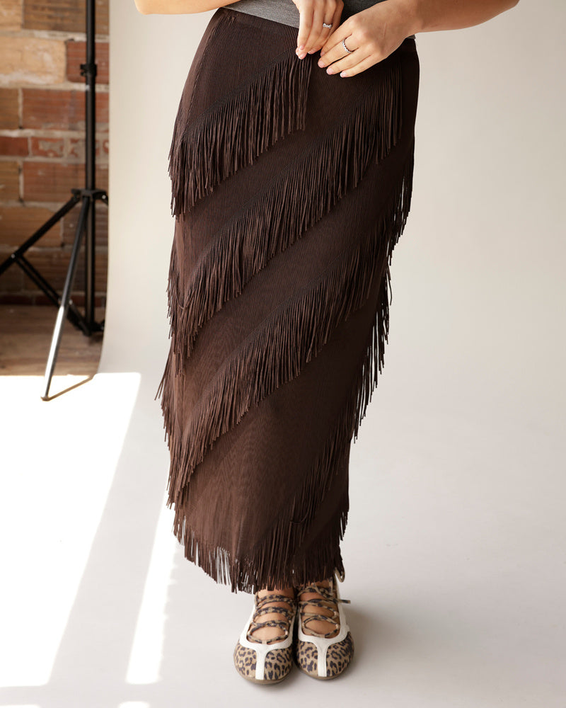 Dark brown maxi fringe skirt with diagonal layered fringe detail, maxi length