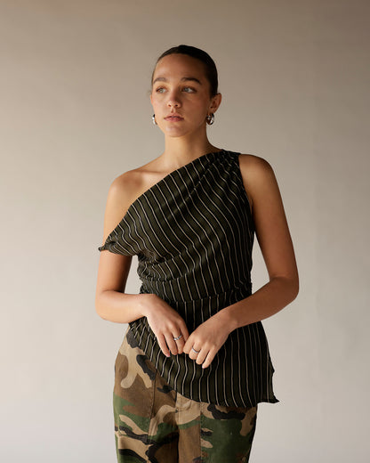 Women's black pinstripe one-shoulder smocked top paired with camo pants