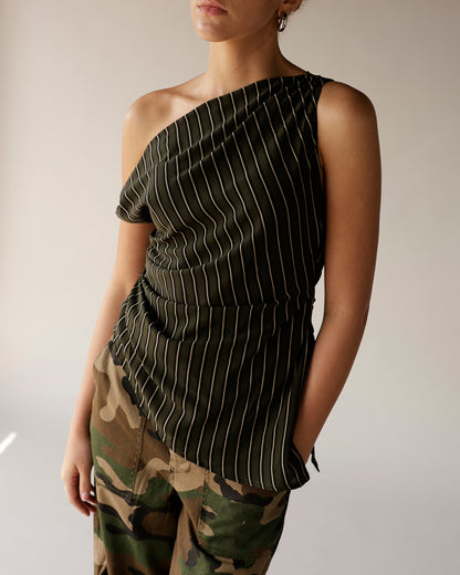 Dark green pinstripe one-shoulder ruched top paired with camo cargo pants
