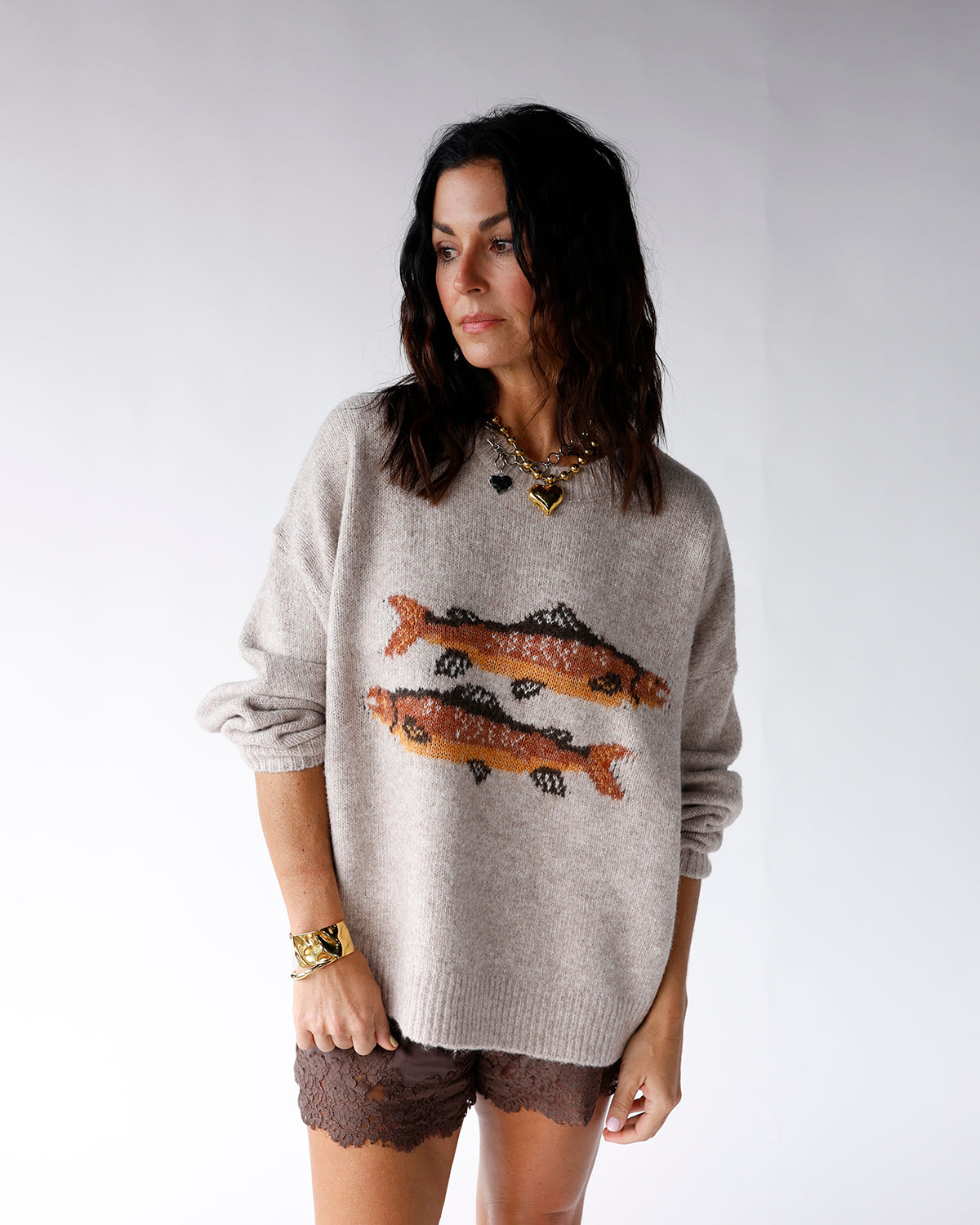 light brown embroidered fish sweater