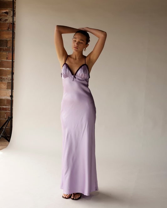 Lilac satin midi slip dress with dark lace trim and thin straps