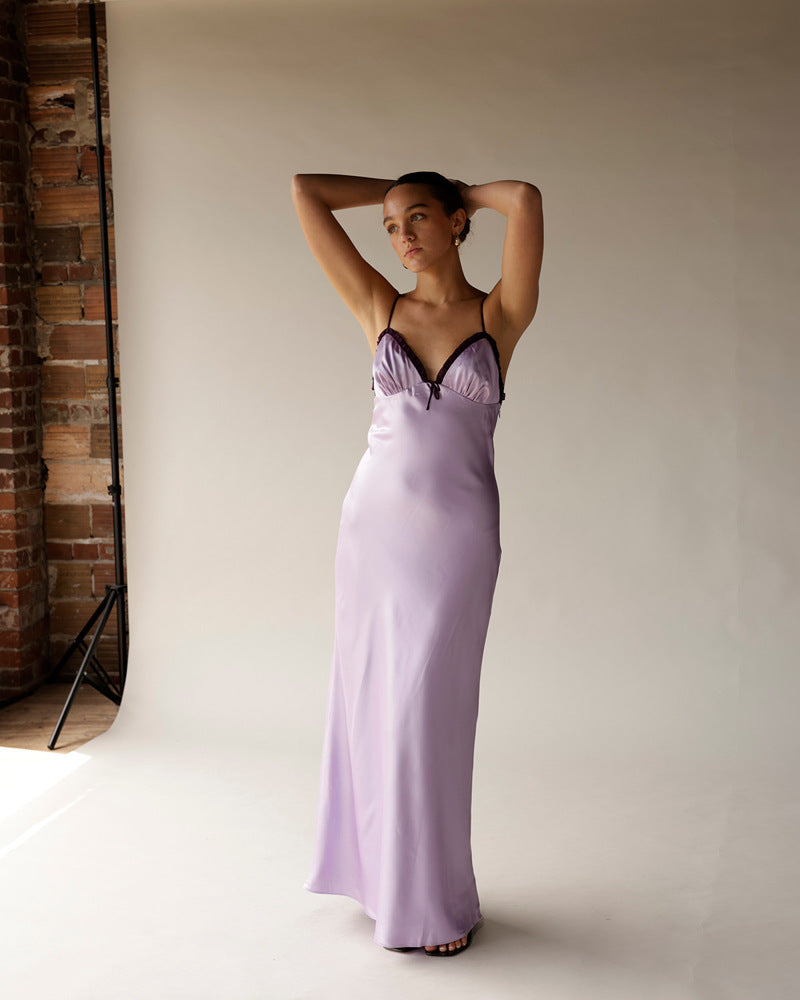 Lilac satin midi slip dress with dark trim, sweetheart neckline, and thin straps