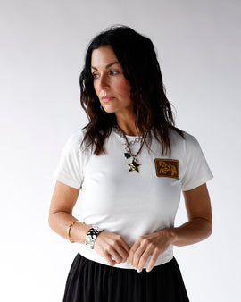 white western baby tee with a horse patch on the left side of the chest