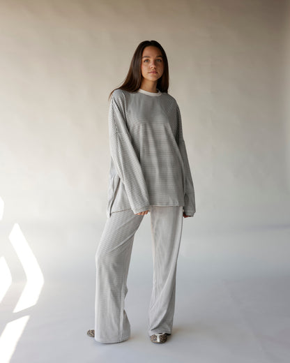 Gray and white striped wide-leg lounge pants with relaxed straight fit