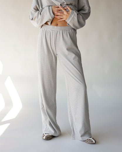Gray and white striped wide-leg lounge pants with elastic waistband