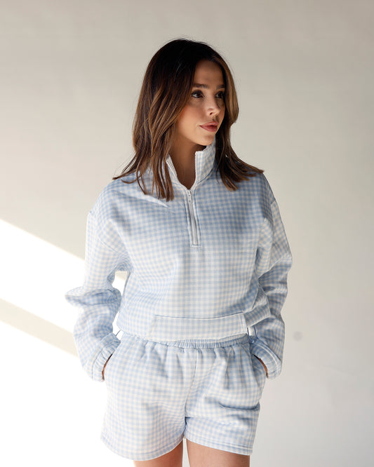 white and blue gingham quarter zip pullover