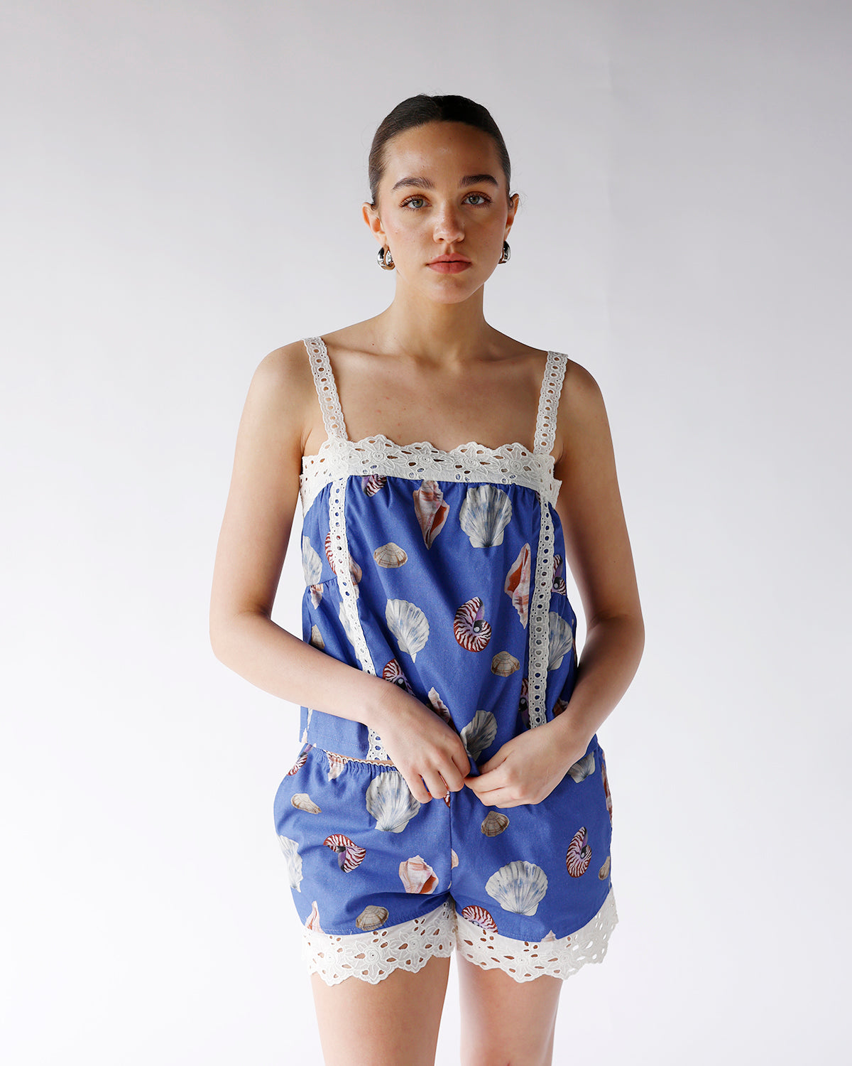 blue seashell print tank top with crochet lace straps and detailing