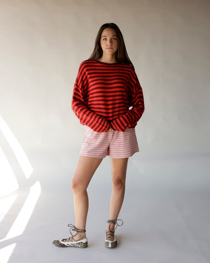 Red and burgundy striped oversized mock neck sweater with drop shoulders