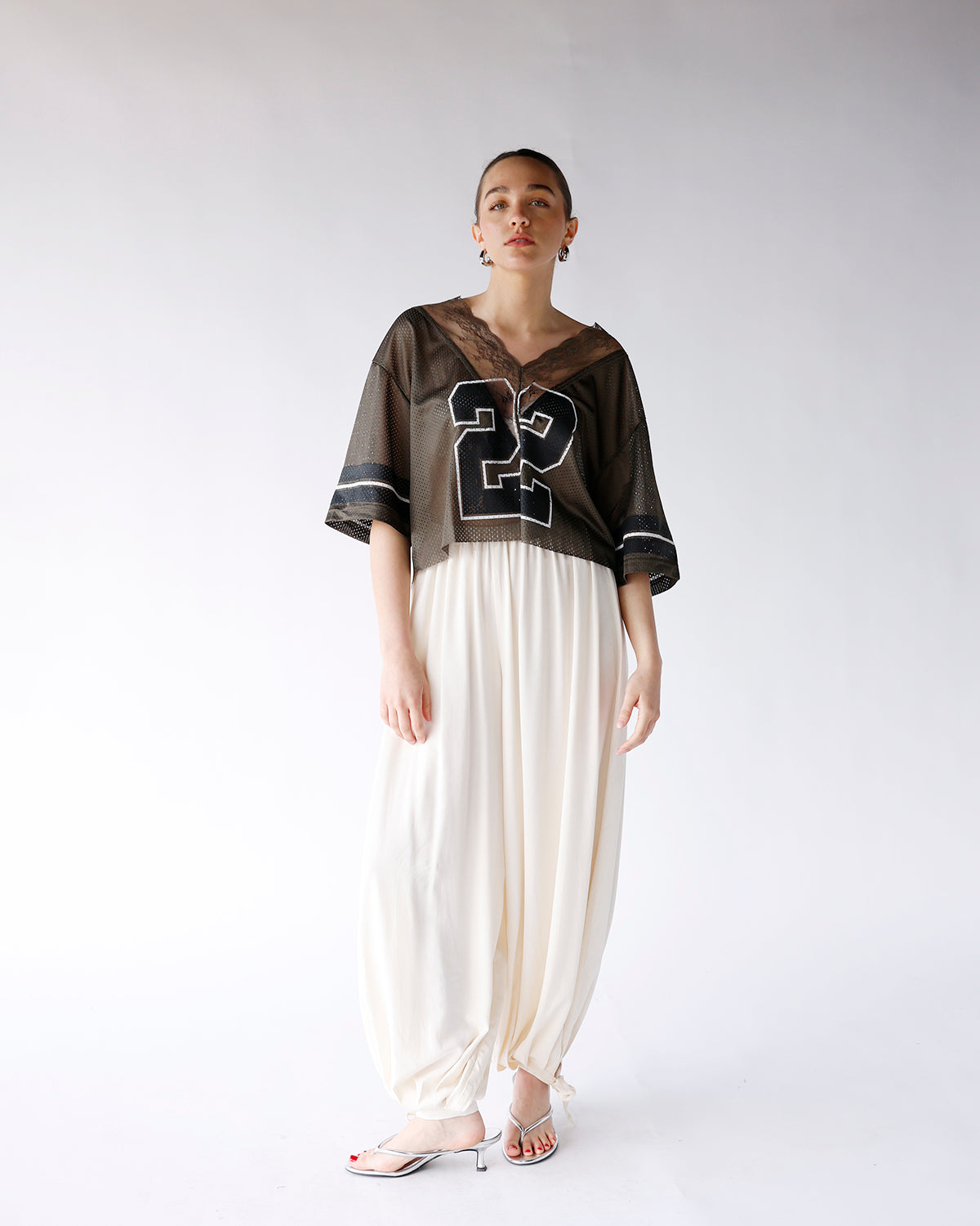 cream balloon pants with hem tie detail and elastic waistband