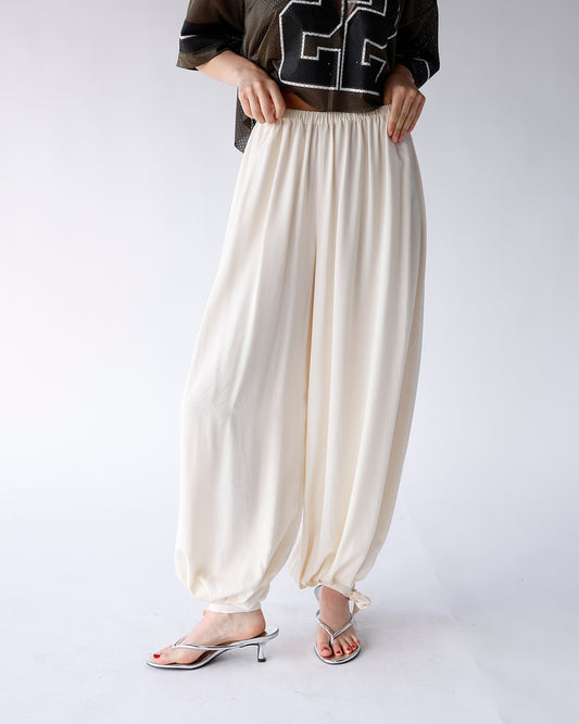 cream balloon pants with hem tie detail and elastic waistband