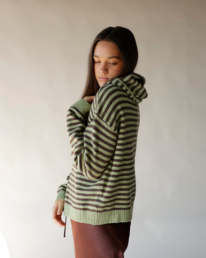Brown and olive striped knit zip-up hoodie with ribbed hem, worn oversized