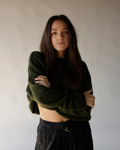 Dark olive cropped mock neck sweater with relaxed fit and long sleeves