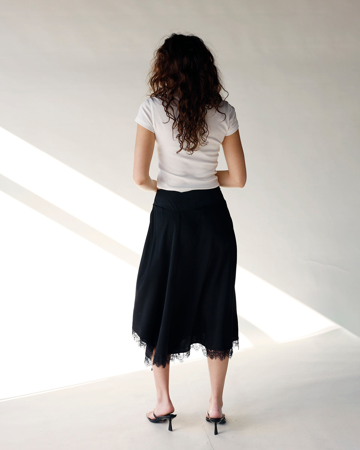 LOLA ASYMMETRIC LACE TRIM MIDI SKIRT