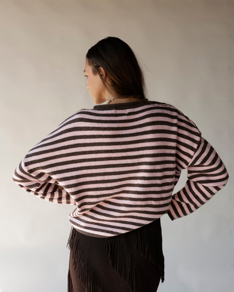 Pink and brown striped oversized mock neck sweater, long sleeves, back view