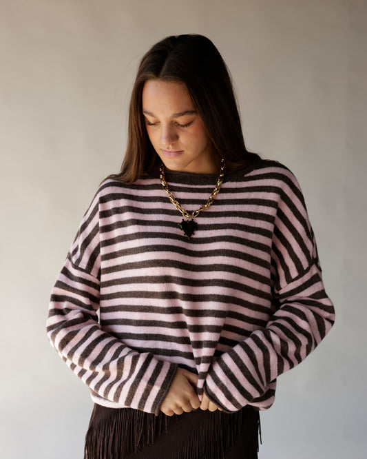 Pink and brown striped mock neck sweater with long sleeves and relaxed fit