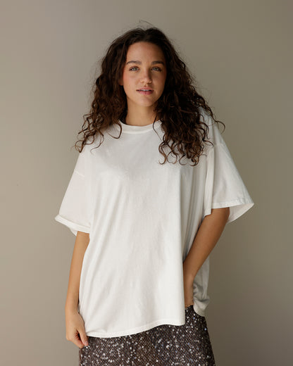 daydreamer oversized white short sleeve t-shirt with a ribbed crew neckline, dropped shoulders and relaxed, loose-fitting silhouette.