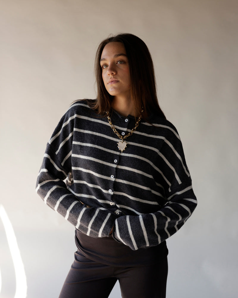 Dark charcoal striped button-front knit cardigan sweater with white horizontal stripes