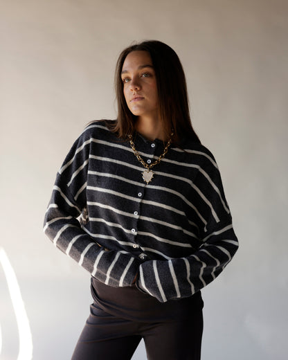Dark charcoal striped button-front knit cardigan sweater with white horizontal stripes