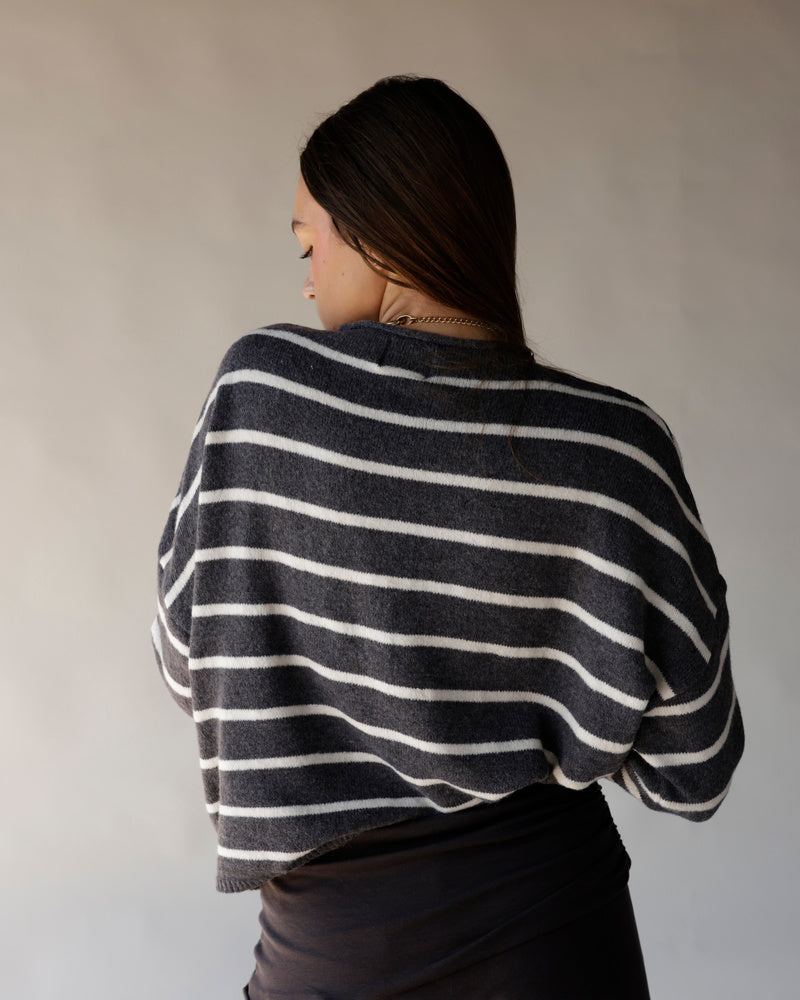 Charcoal gray striped cropped sweater with white horizontal stripes, oversized fit