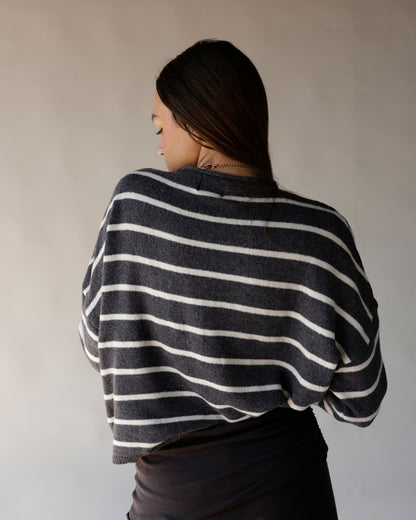 Charcoal gray striped cropped sweater with white horizontal stripes, oversized fit