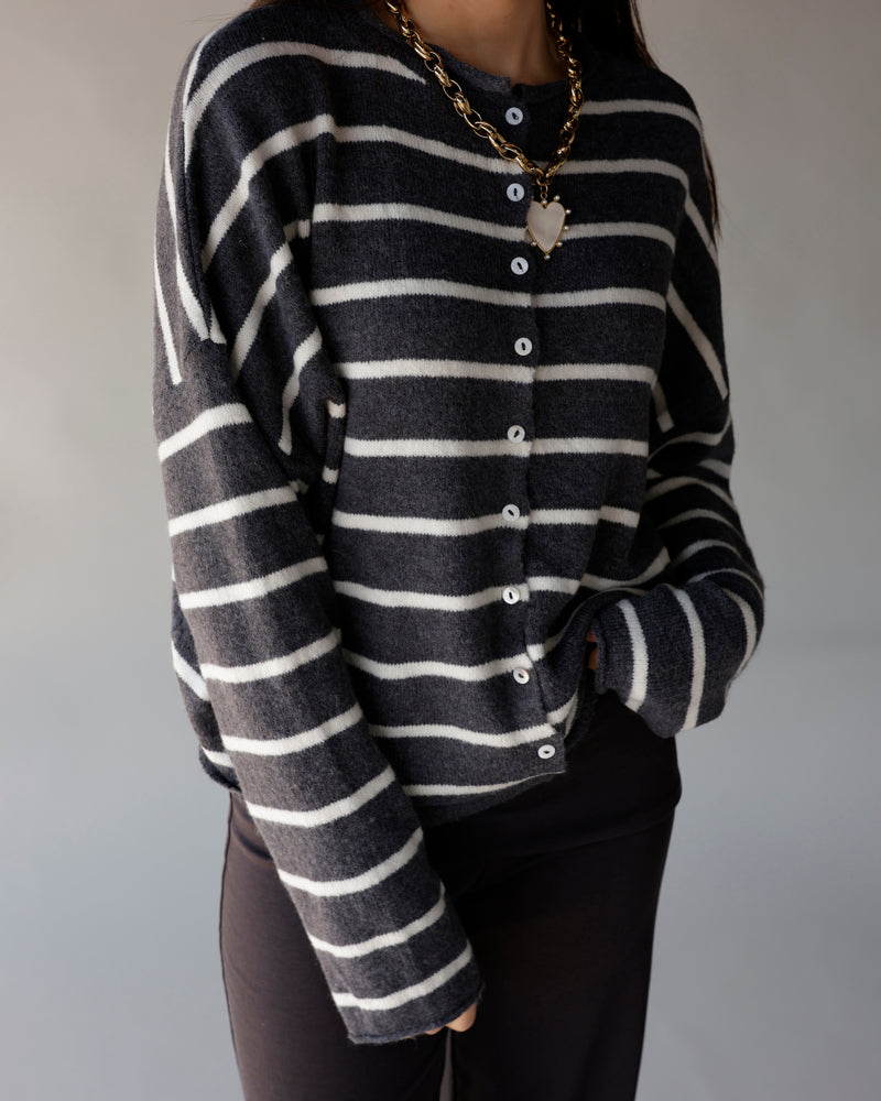 Dark grey and white striped button-front knit cardigan with small pearl buttons