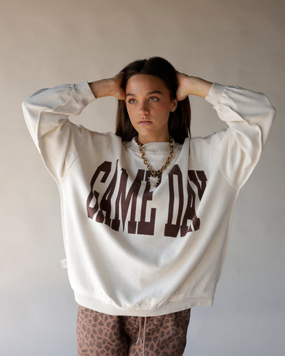 Cream oversized Game Day reversible mock neck sweatshirt with brown varsity lettering