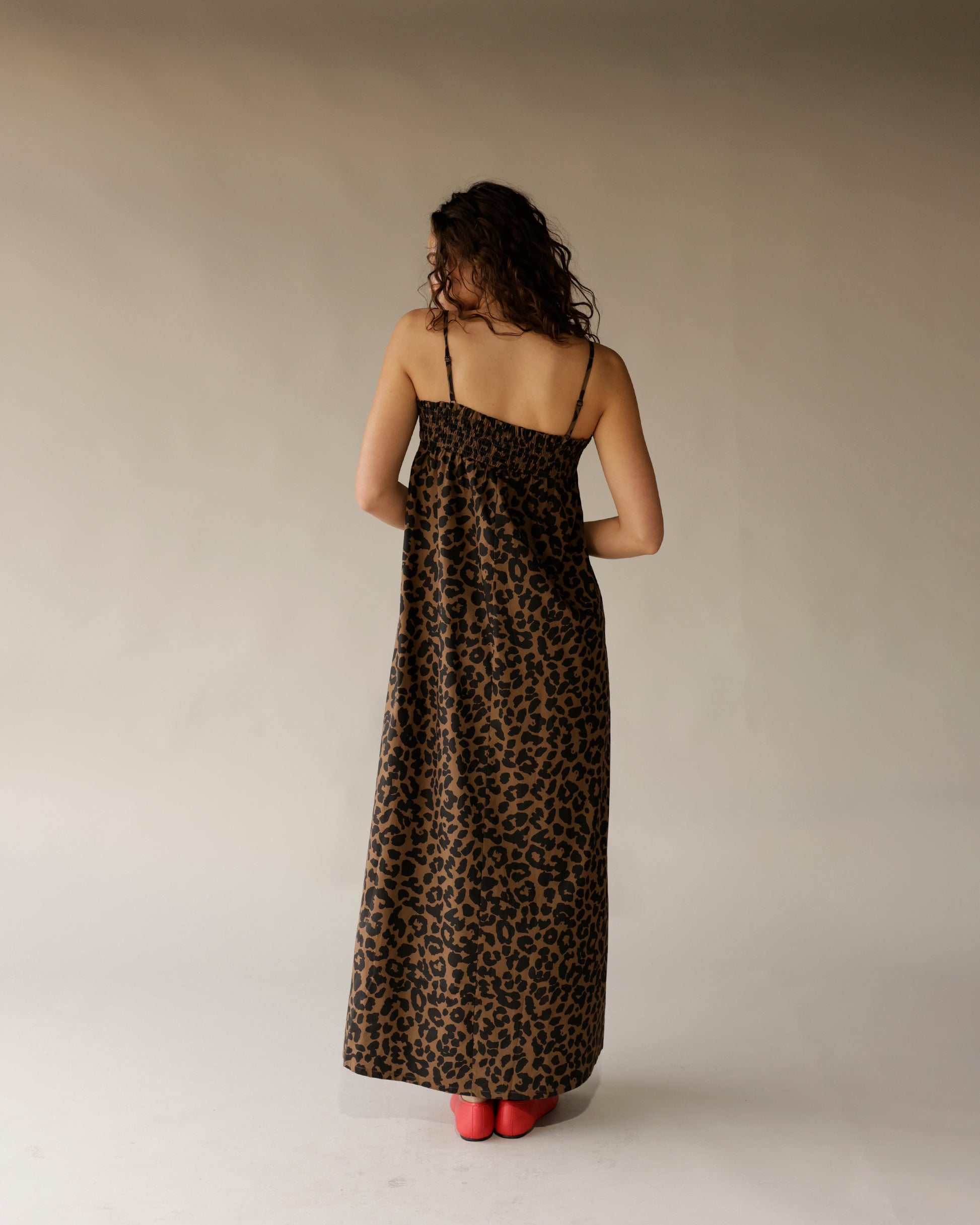 Brown leopard print maxi dress with spaghetti straps and smocked back detail