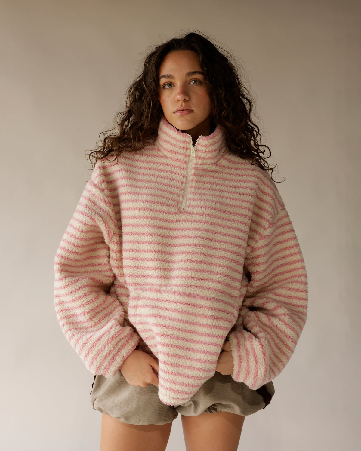 Pink and cream striped sherpa quarter-zip pullover with oversized fit and mock neck