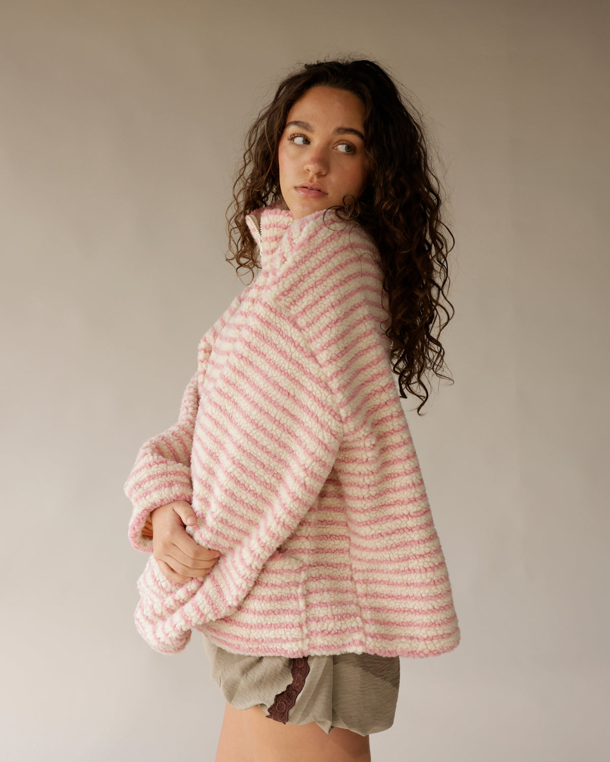 Pink and cream striped sherpa pullover with mock neck and oversized fit